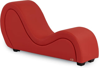 ANDOV curved lounge chair in red PU upholstery, three-quarter view on a white background.